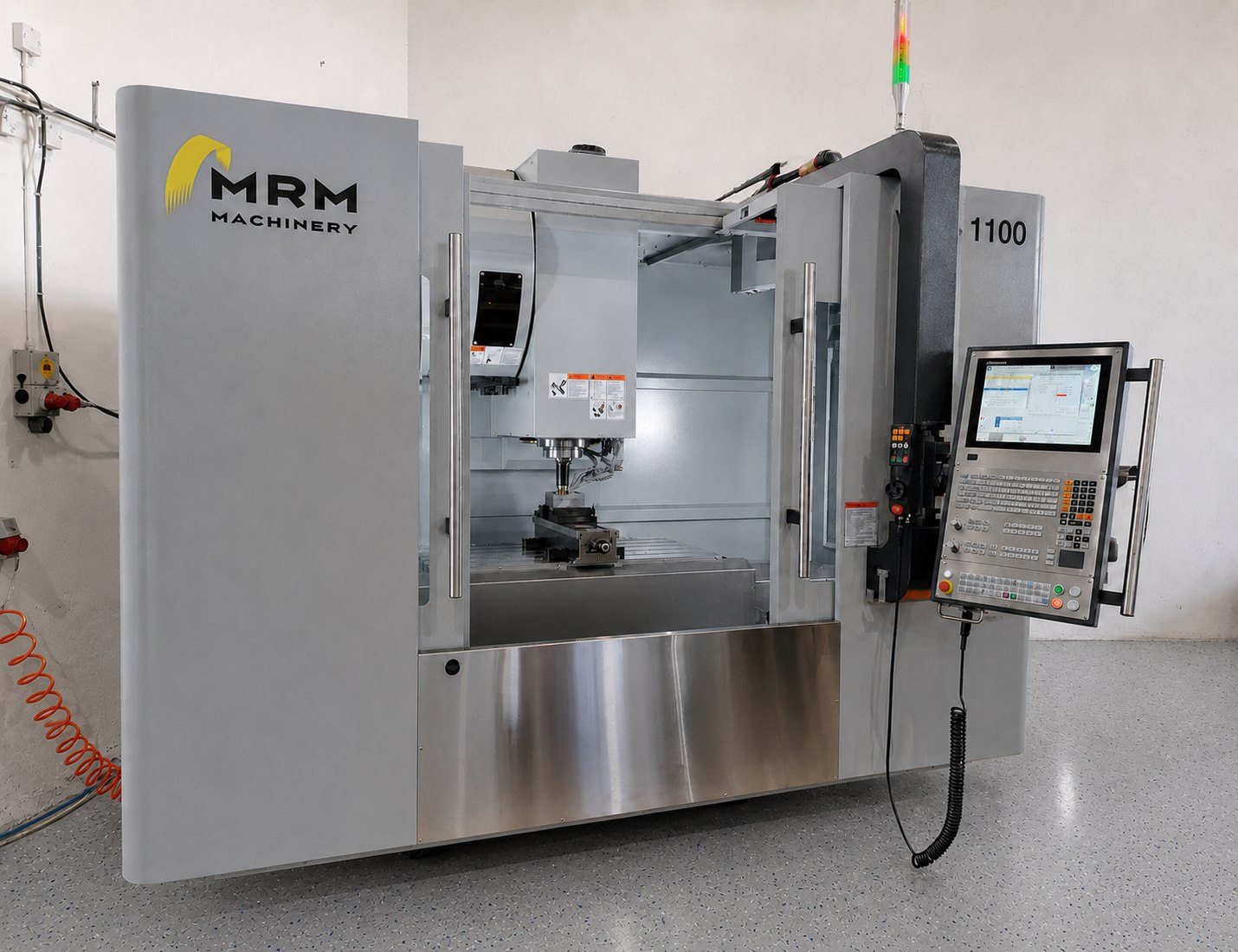 VMC-1100 CNC machining center at HEST